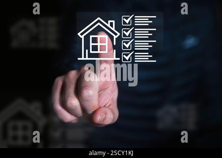 A person touches a digital housing checklist icon, symbolizing real estate, property management, home inspection, or smart home technology, with a fut Stock Photo