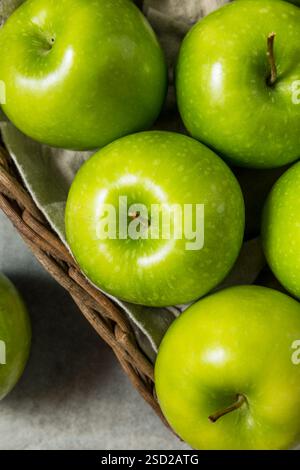 Healthy Organic Green Granny Smith Apples in a Basket Stock Photo