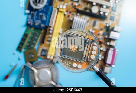 Magnifying glass inspecting electronic circuit board with no computer chip, showcasing quality control, hardware analysis, and innovation in tech Stock Photo