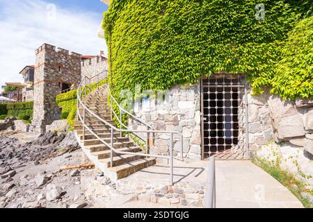 sozopol, bulgaria - aug 09, 2015: southern fortress wall and tower. europe downtown. sunny morning. popular tourist attraction. late antique and medie Stock Photo