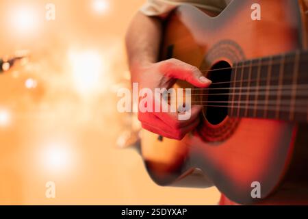 Musician performing a guitar solo on the stage Stock Photo