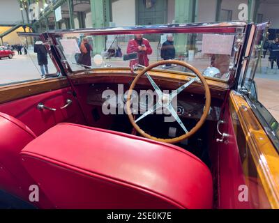 Vintage convertible showcases timeless elegance at classic car show Stock Photo