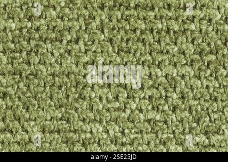 Texture of khaki jacquard fabric, close up of rough weave macro. Material for home textile, upholstery and curtain decor, garment. Background, wallpap Stock Photo
