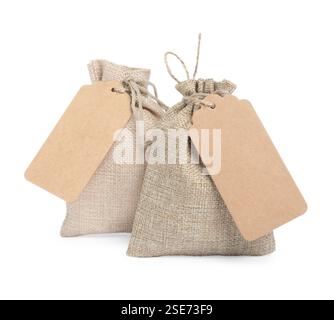 Burlap bags with tags isolated on white Stock Photo