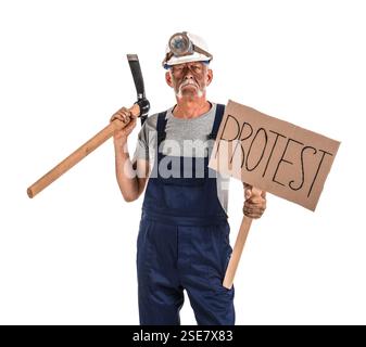 Protesting miner man with pick axe and placard on white background Stock Photo