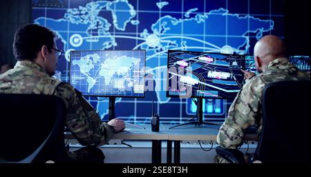 Cyber Technology Expert Monitors Security Cameras In Government Control Center. Stock Photo