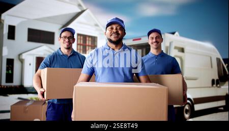 Professional Movers Unloading Boxes from Delivery Van in Diverse Group. Stock Photo