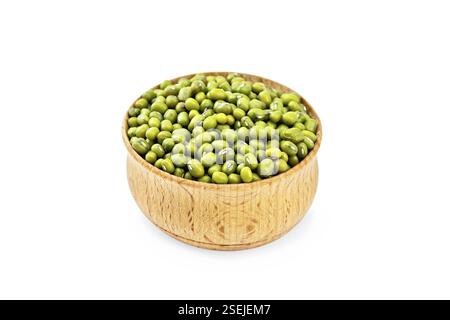 Green lentils mung in a wooden bowl isolated on white background Stock Photo