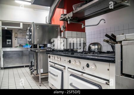 Professional kitchen in restaurant  Work surface and kitchen equipment. Stock Photo
