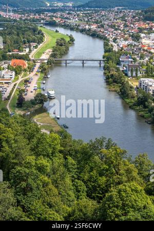 Aerial view of the Danube river and the town of Tulcea with lush green ...