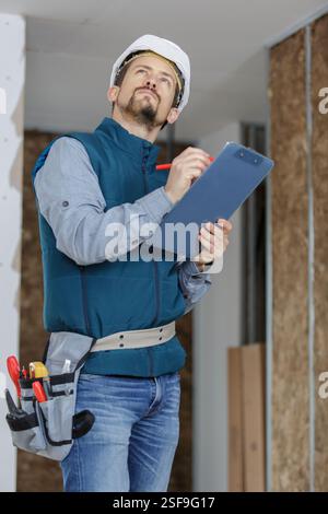 smart builder thinking about something Stock Photo