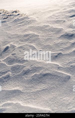 Shapes, textures, patterns created by snow and wind. Stock Photo