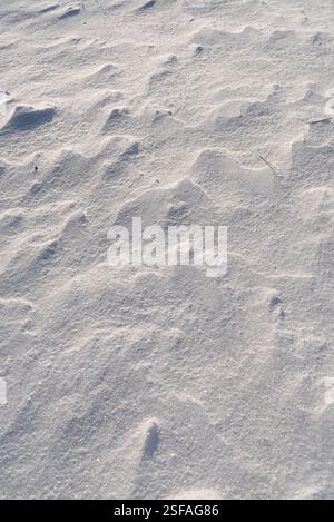 Shapes, textures, patterns created by snow and wind. Stock Photo