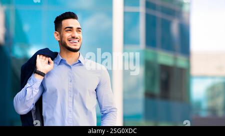 Happy muslim entrepreneur going home from job Stock Photo