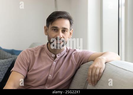 Middle-aged Portuguese man posing for camera with serious expression Stock Photo