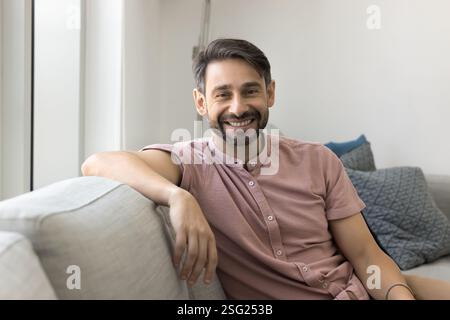 Home portrait of smiling middle aged Portuguese man Stock Photo