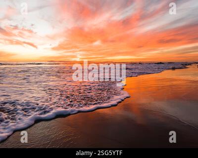 Low angle view of a majestic California sunset over the Pacific Ocean Stock Photo