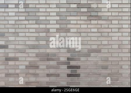 Gray tile brick wall background Stock Photo