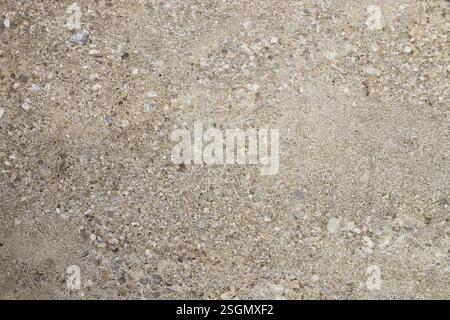 Natural Beige Stone Surface with Granular Texture Stock Photo