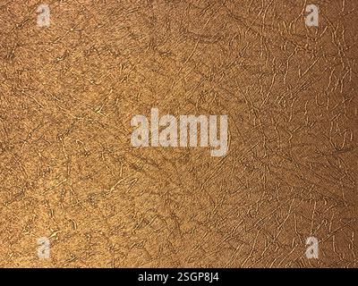 Close up of leather fabric texture in gold color. Seamless golden brown leather veins background texture. Stock Photo