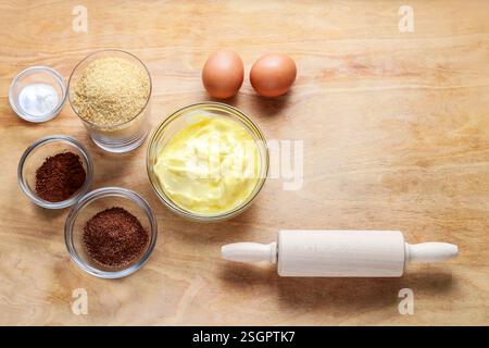 Ingredients necessary to make gingerbread pastry. Preparing easter gingerbread cookies. Steps of making pastry. Stock Photo