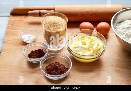Ingredients necessary to make gingerbread pastry. Preparing easter gingerbread cookies. Steps of making pastry. Stock Photo