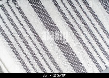 Background with white gray stripe fabric texture. A strict and laconic background with stripes of different widths. High quality photo Stock Photo