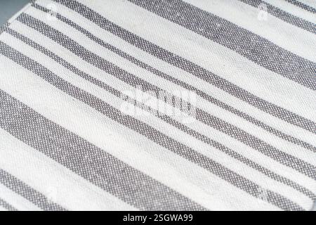 Background with white gray stripe fabric texture. A strict and laconic background with stripes of different widths. High quality photo Stock Photo