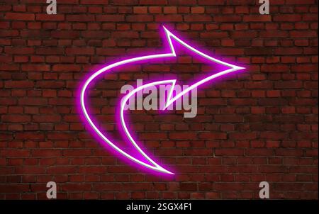 Pink neon arrow-shaped pointer on brick wall Stock Photo