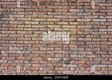 Background from an old rustic red brick wall Stock Photo