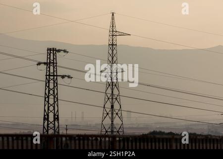 Foggy afternoon daytime cityscape high voltage power line near capital city of Bulgaria, Sofia, Europe, EU Stock Photo