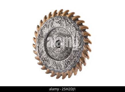 Old decorated metal saw blade isolated on white background with cliping path Stock Photo