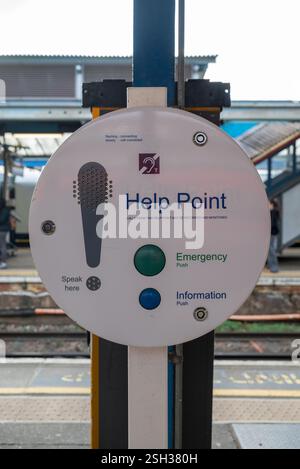 Help point sign button and speaker on train platform Stock Photo - Alamy
