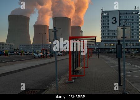 Big chimneys with white smoke in winter sunny day near nuclear power plant in Temelin CZ 02 04 2025 Stock Photo