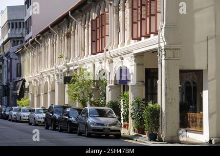 A street lined with British Colonial styled buildings along Purvis