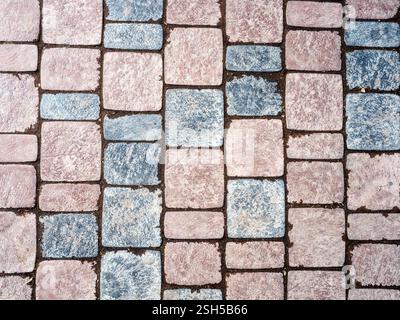 textured background - brown and gray stone tiles on path surface Stock Photo