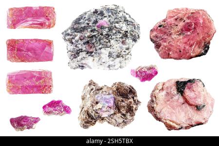 various specimens of uncut ruby rocks cutout on white background Stock Photo