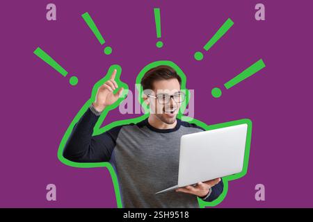 Male programmer with laptop, raised index finger and exclamation marks on violet background Stock Photo