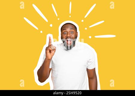 Surprised African-American man with raised index finger and exclamation marks on yellow background Stock Photo
