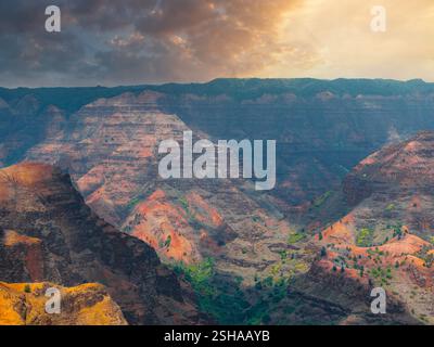 Waimea Canyon with Rugged Cliffs and Vibrant Layers on Kauai Island Stock Photo