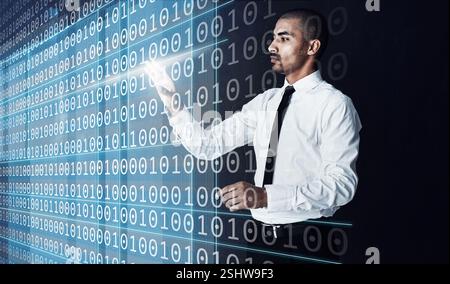 Man, touch and hologram in office for coding, software development or numbers at night. Working late, programmer or future technology in dark agency Stock Photo