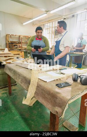 Visually impaired people in wood shop Stock Photo