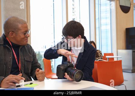 Man with Down Syndrome at photography class Stock Photo