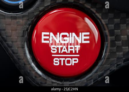 Ferrari start and stop engine button in a luxury supercar Stock Photo
