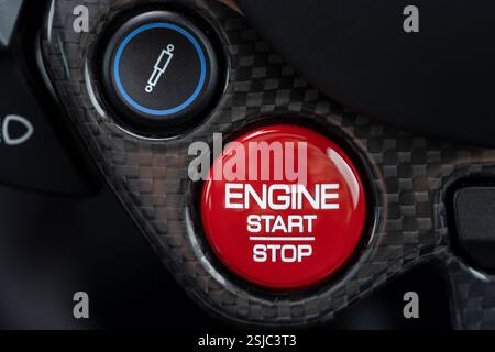 Ferrari start and stop engine button in a luxury supercar Stock Photo