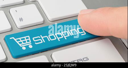 Keyboard with blue key - Shopping Stock Photo