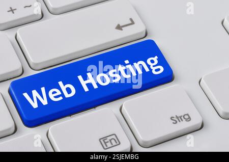 Keyboard with colored key - Web Hosting Stock Photo
