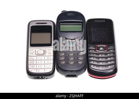 Old cell phones Isolated on white background Stock Photo