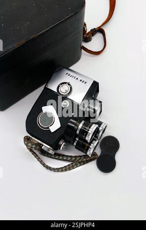 vintage 1960s Fujica 8EE Double 8mm Cine Film Camera - Triple Lens  isolated on white studio background Stock Photo