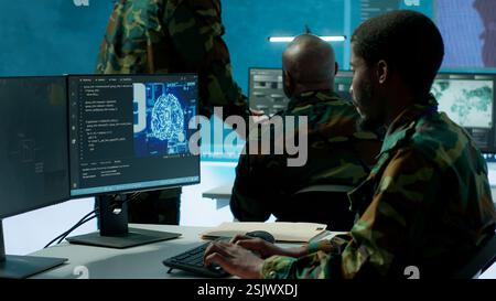 Programming engineer soldier handles AI brain and deep learning data on ...